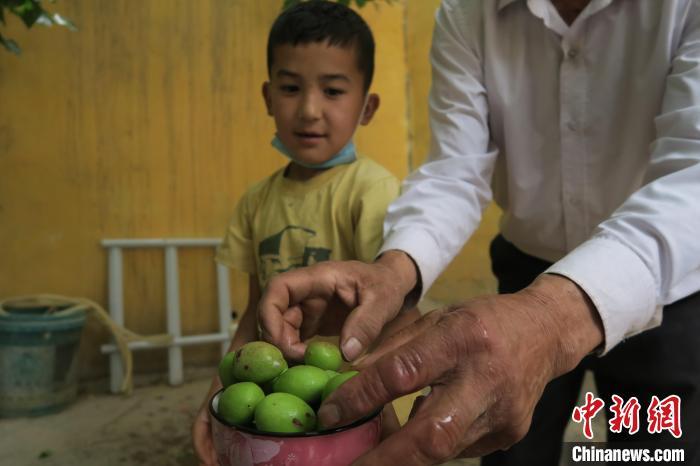 圖為進藏先遣英雄連誓師地原址所在的新疆維吾爾自治區(qū)和田地區(qū)于田縣普魯村現(xiàn)貌?！畛坛?攝