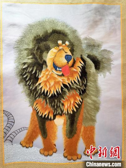 圖為藏繡作品?！∑钤鲚?攝