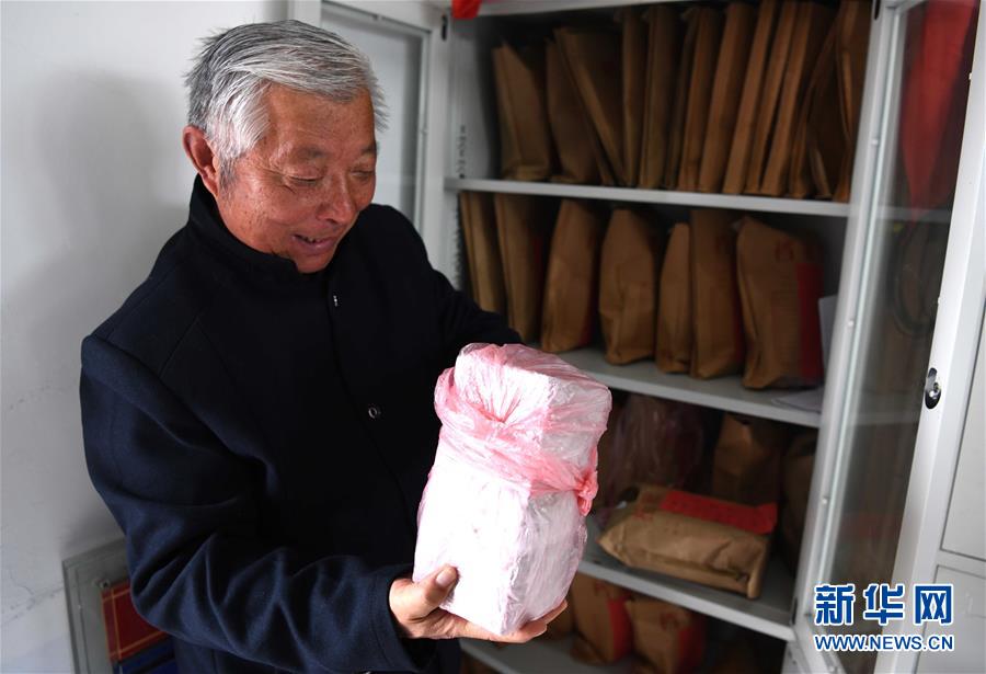 (圖片故事)(2)年介濤:將為烈士尋親進(jìn)行到底